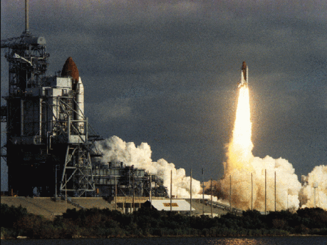 Columbia Waits, Discovery Launches