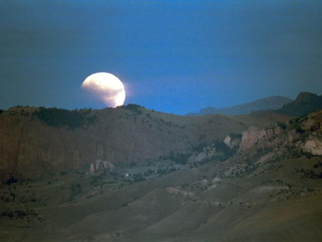 Eclipse Over The Mountain