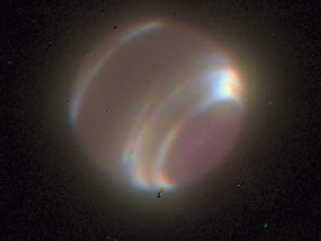 Neptune through Adaptive Optics