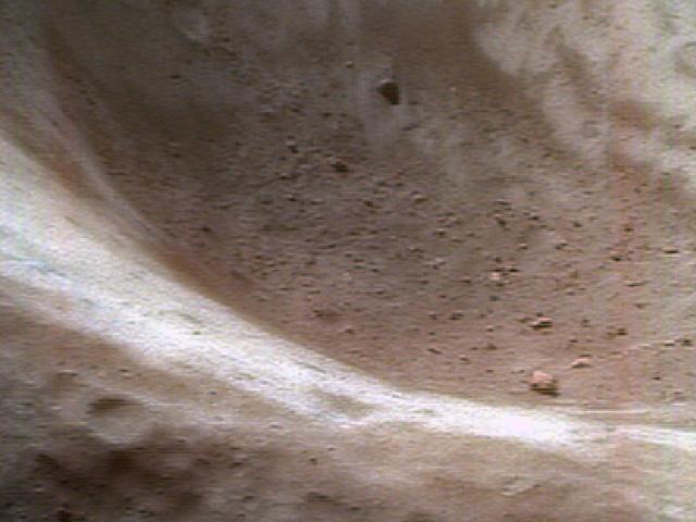 The Regolith of Asteroid Eros