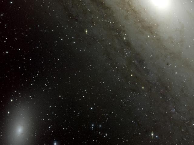 Dwarf Elliptical Galaxy NGC 205 in the Local Group