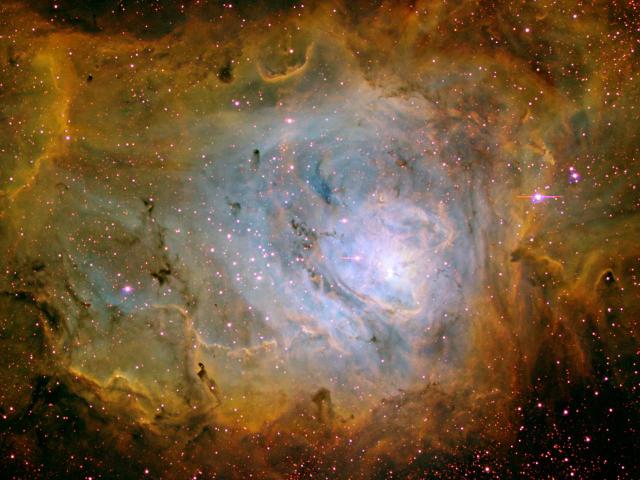 The Lagoon Nebula in Three Colors