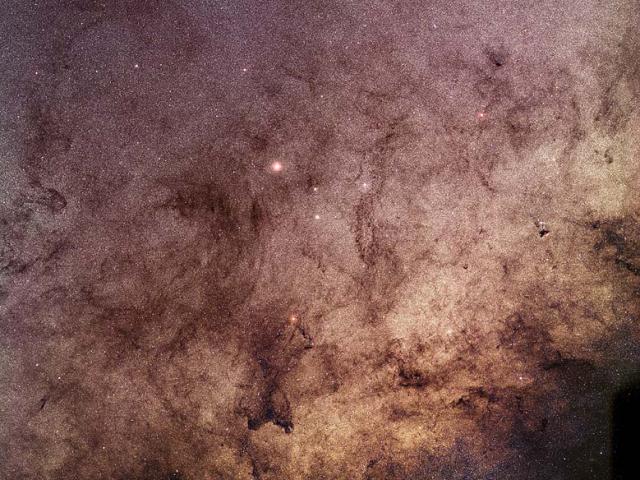 Stars and Dust Through Baade’s Window