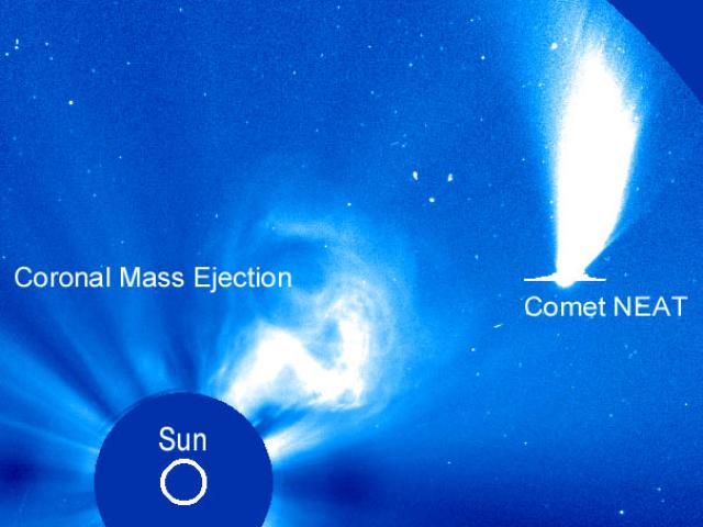 Comet NEAT Passes an Erupting Sun