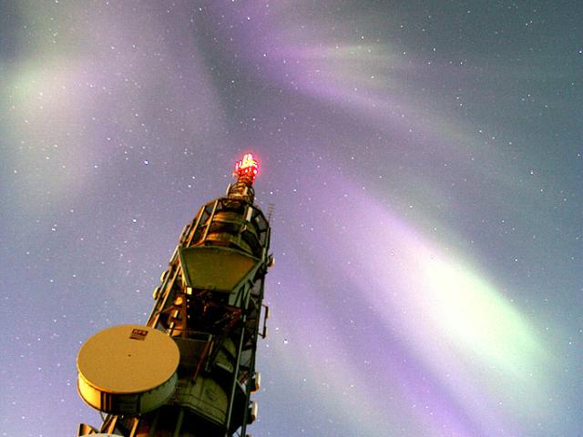 Aurora Over a Communications Tower