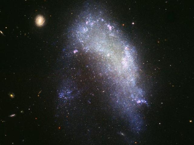 NGC 1427A: Galaxy in Motion