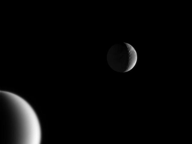 Crescents of Titan and Dione