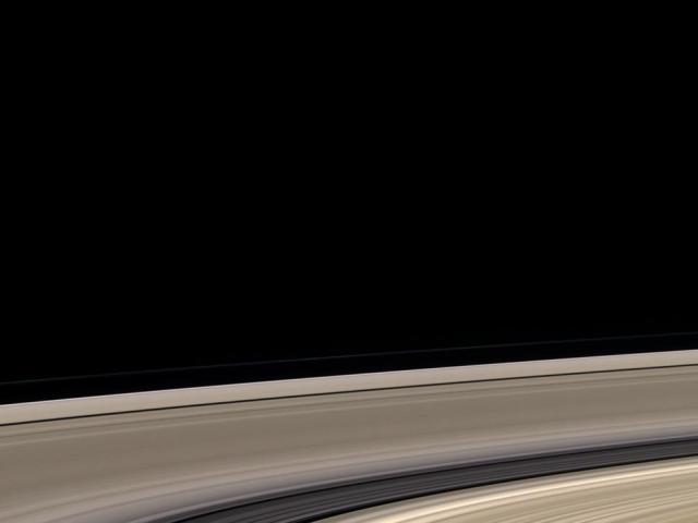Saturn: Dirty Rings and a Clean Moon