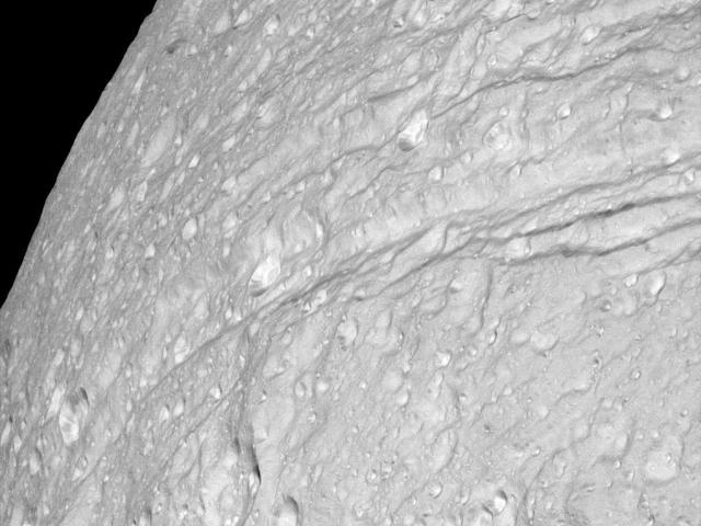 Cratered Cliffs of Ice on Saturns Tethys