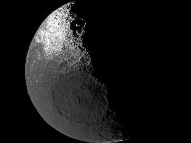 Dark Terrain on Saturn s Iapetus