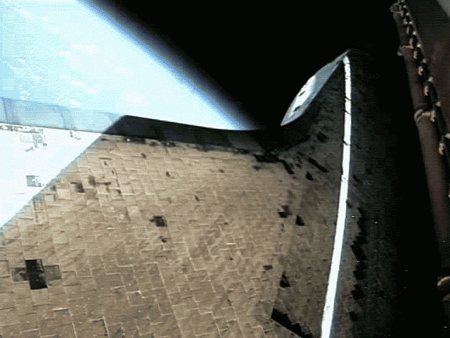 A Space Shuttle Climbs to Orbit