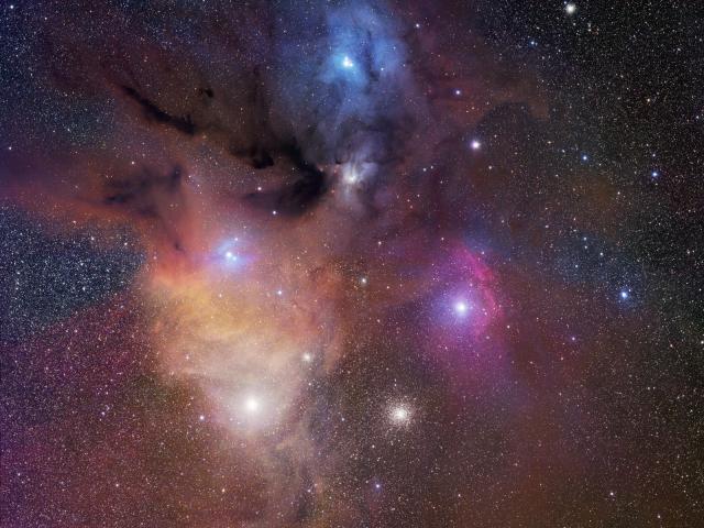 The Colorful Clouds of Rho Ophiuchi