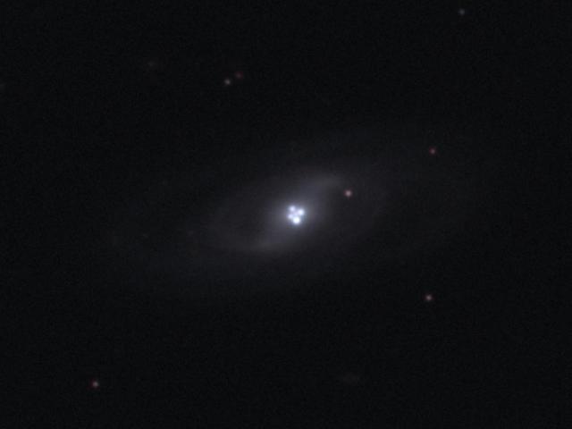 The Einstein Cross Gravitational Lens