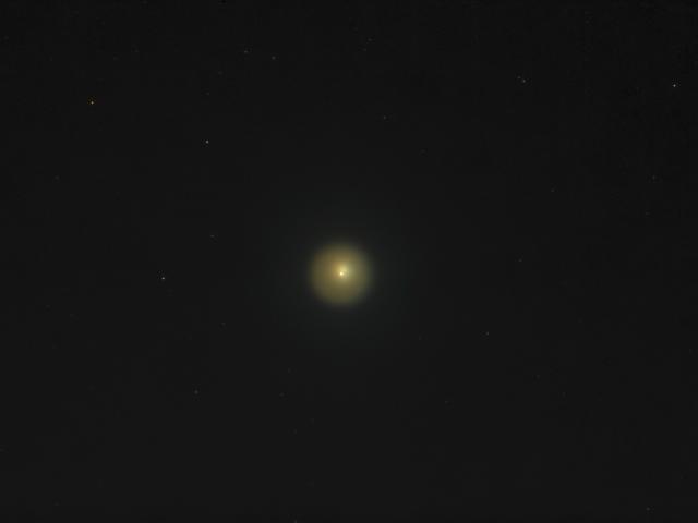 A Telescopic View of Erupting Comet Holmes