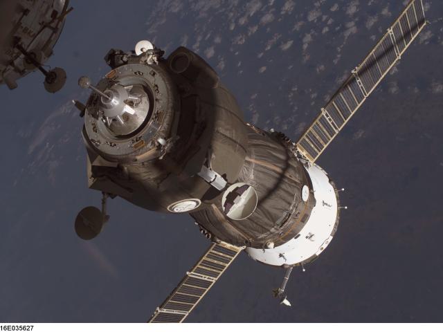 A Supply Ship Docks with the International Space Station