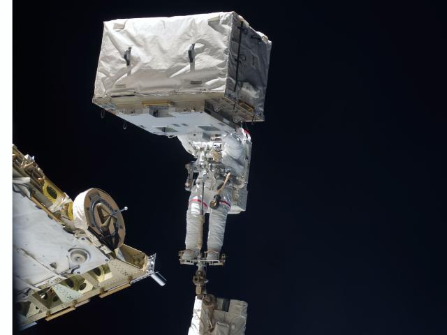 Astronauts Head Upgraded During Spacewalk