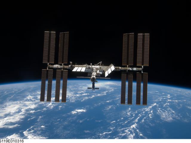 APOD: 2009 April 6 The International Space Station Expands Again