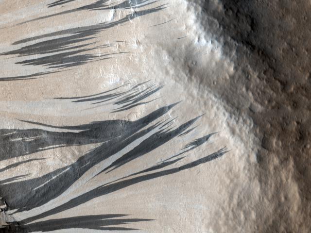 Slope Streaks in Acheron Fossae on Mars