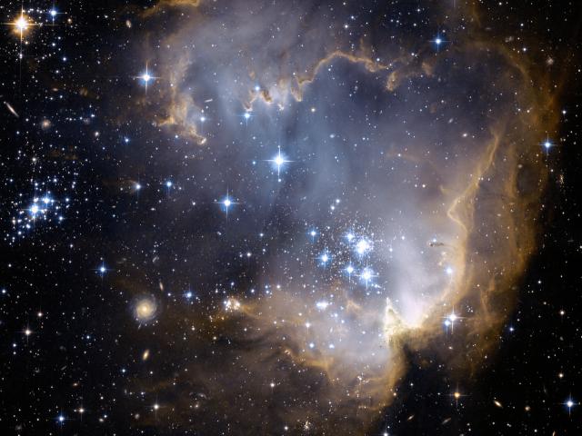 NGC 602 and Beyond