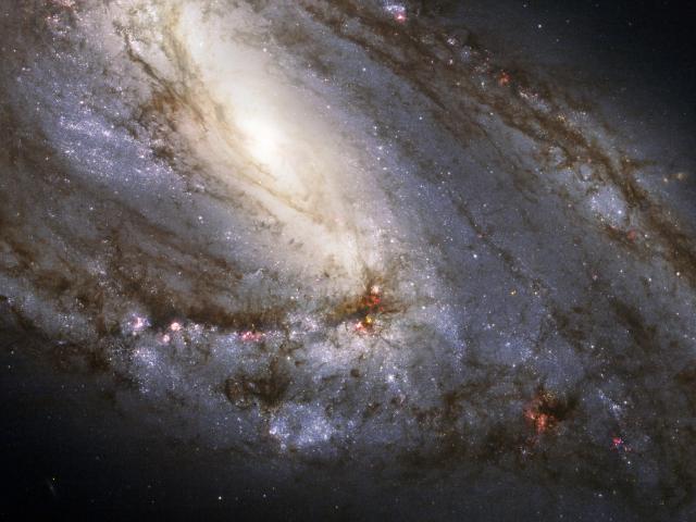 Unusual Spiral Galaxy M66 from Hubble