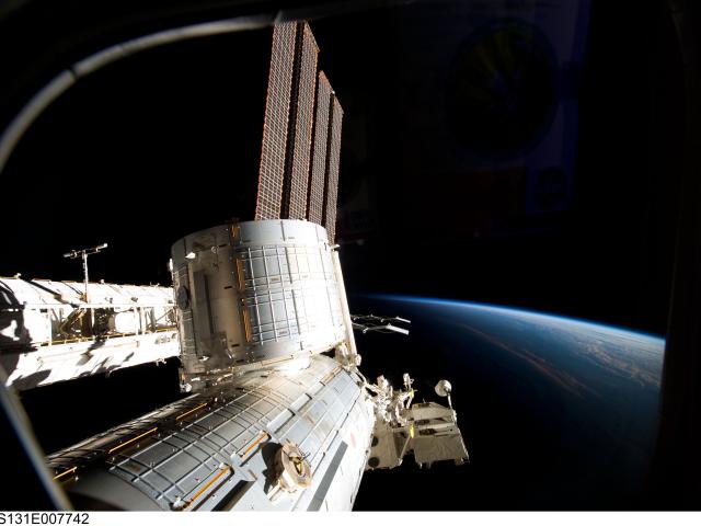 A Large Space Station Over Earth