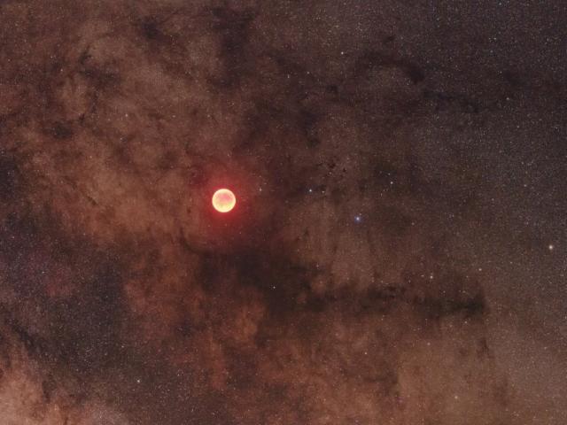 Eclipsed Moon in the Milky Way