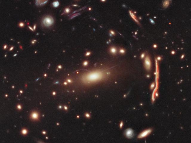 MACS 1206: A Galaxy Cluster Gravitational Lens