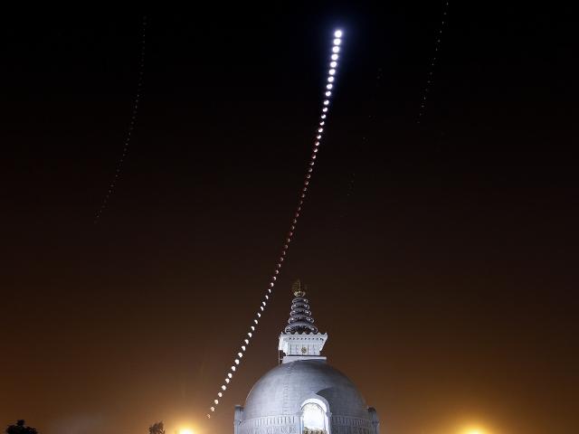 A Lunar Eclipse Over an Indian Peace Pagoda