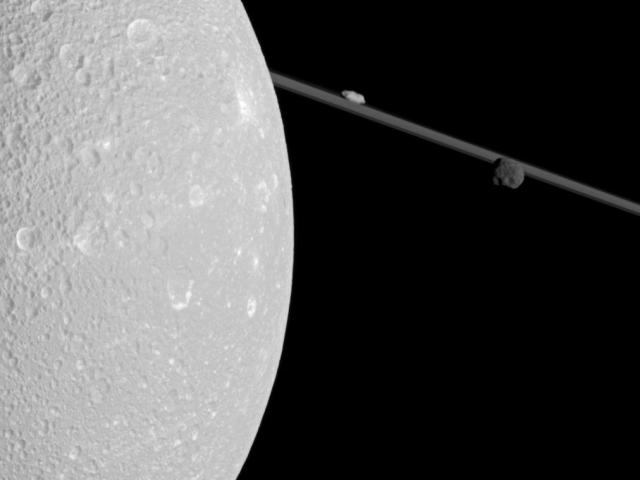 A Close Pass of Saturn’s Moon Dione
