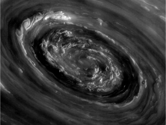 In the Center of Saturn’s North Polar Vortex