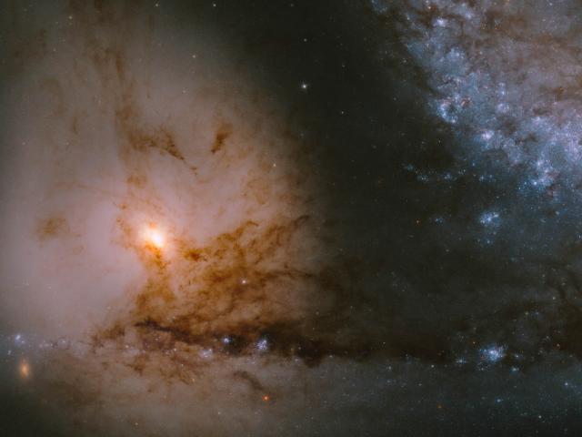 NGC 5195: The Dot under the Question Mark