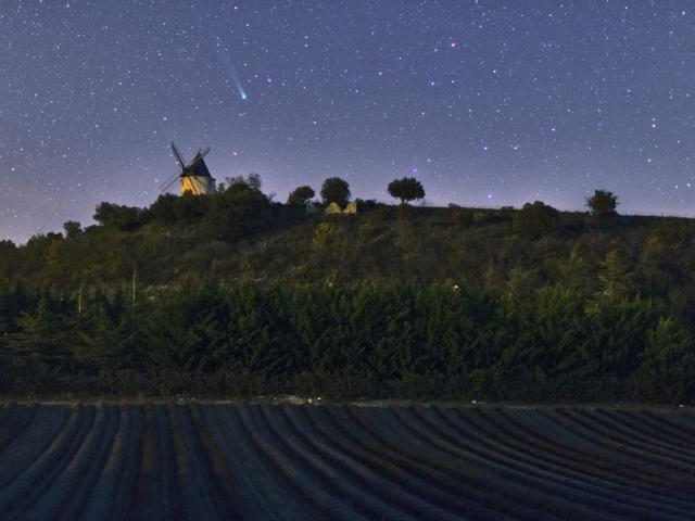 Comet Lovejoy over a Windmill
