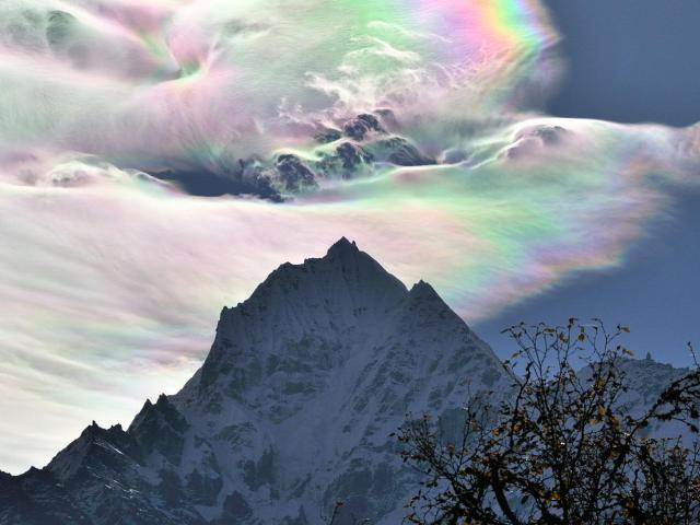 Iridescent Clouds over Thamserku