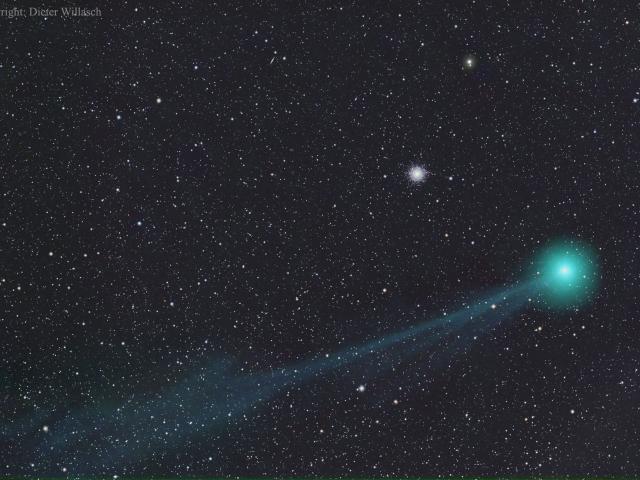 Comet Lovejoy before a Globular Star Cluster
