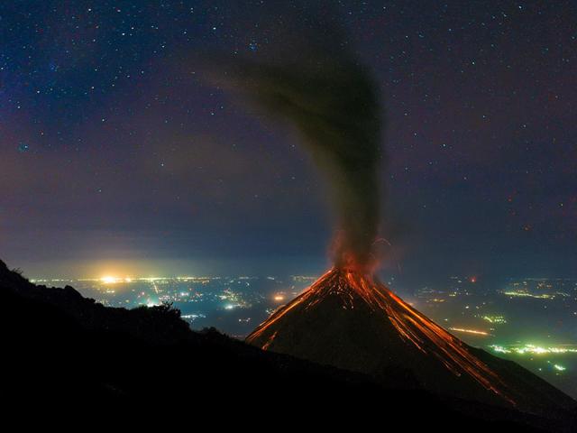 Volcano of Fire Erupts Under the Stars