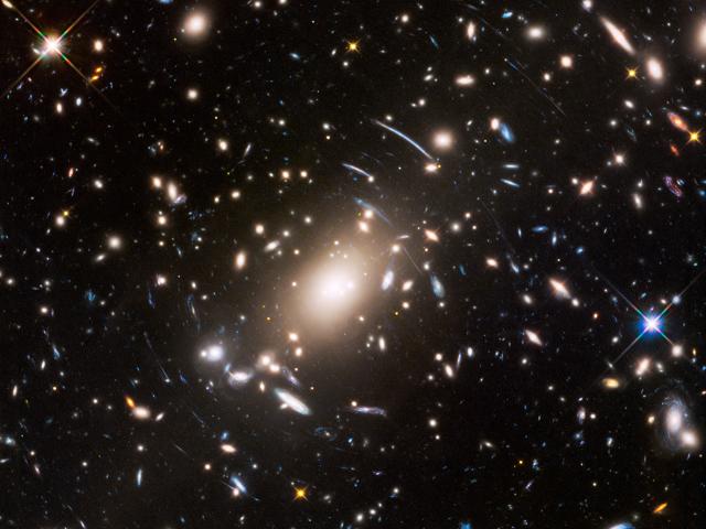 Galaxy Cluster Abell S1063 and Beyond