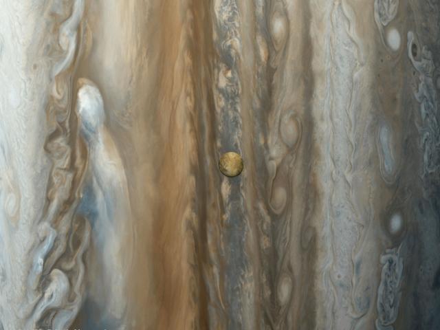 Io over Jupiter from Voyager 1