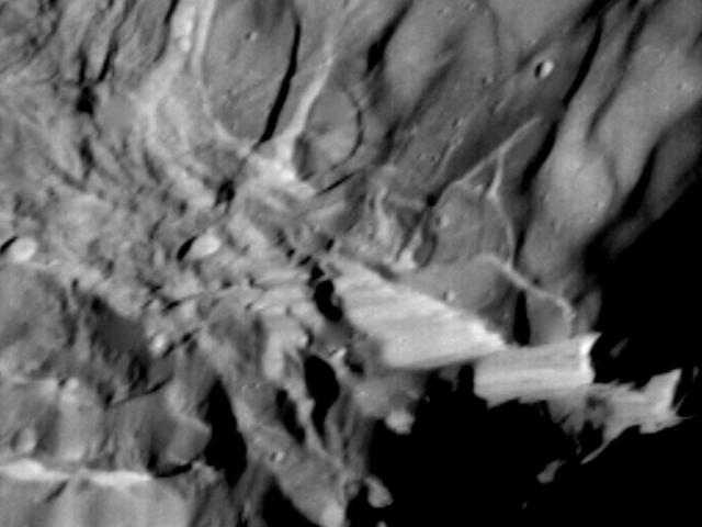 Verona Rupes: Tallest Known Cliff in the Solar System
