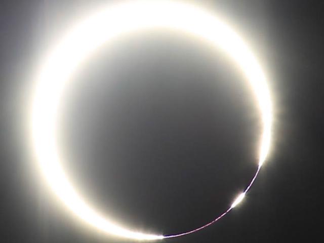 A Solar Eclipse with a Beaded Ring of Fire