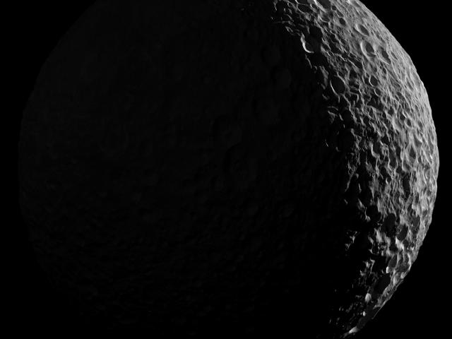 Mimas in Saturnlight