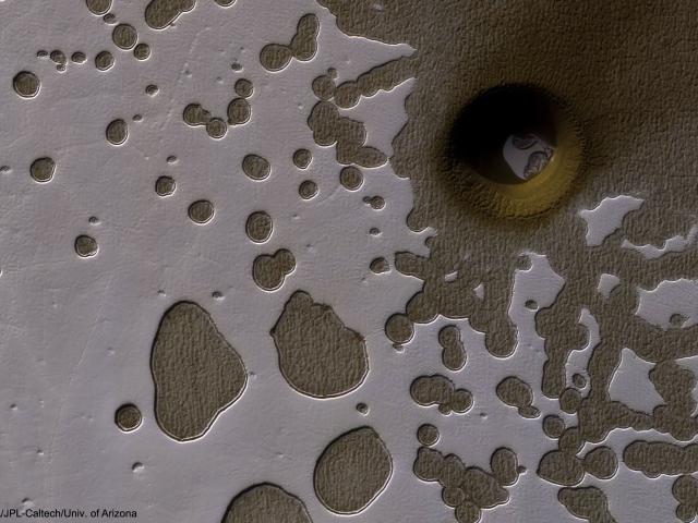 An Unusual Hole in Mars