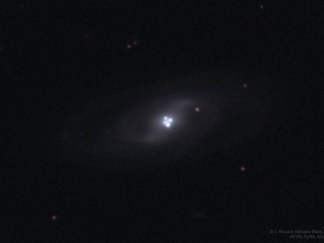 The Einstein Cross Gravitational Lens