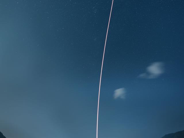 Rocket Launch between Mountains