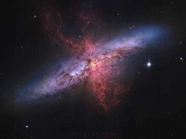 M82: Galaxy with a Supergalactic Wind