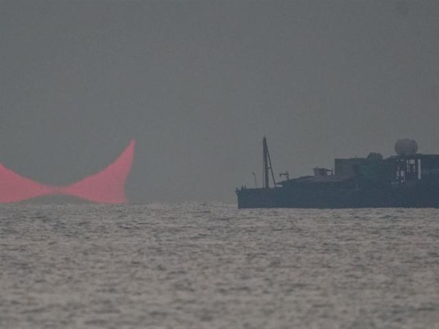 A Distorted Sunrise Eclipse