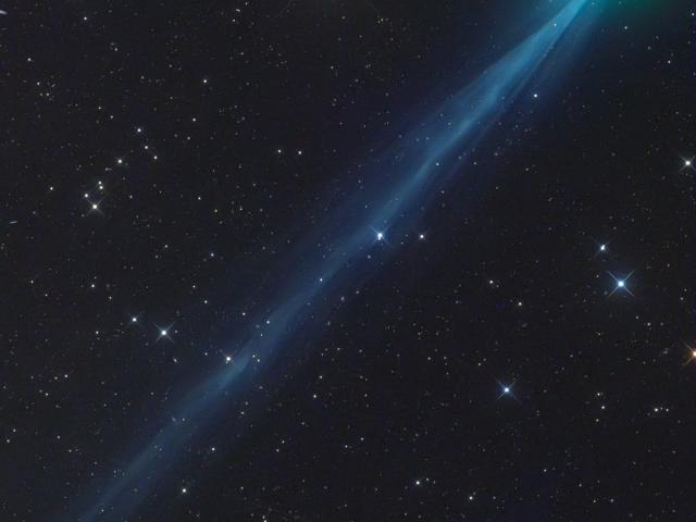 The Ion Tail of New Comet SWAN
