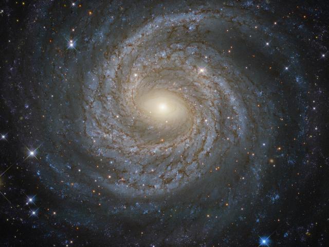 NGC 6814: Grand Design Spiral Galaxy from Hubble