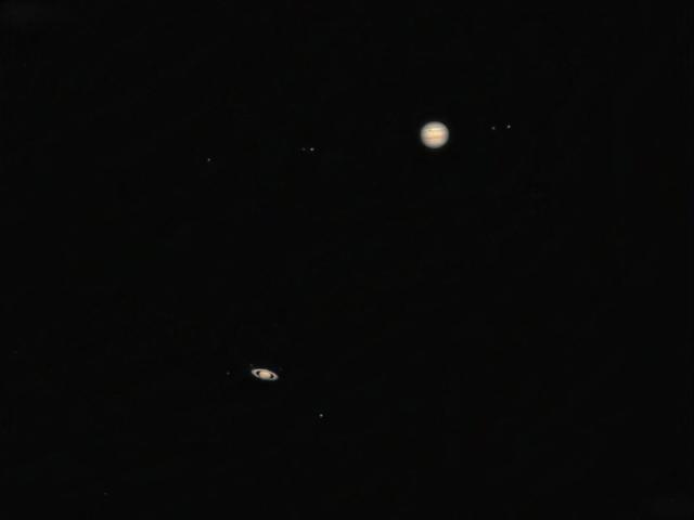 Jupiter Meets Saturn: A Red Spotted Great Conjunction