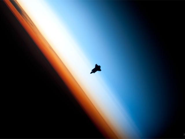 Shuttle Over Earth