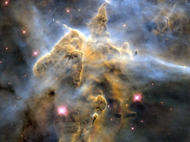 Mountains of Dust in the Carina Nebula